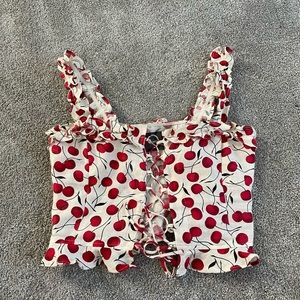 Reformation top, lace up, cherry print, size s